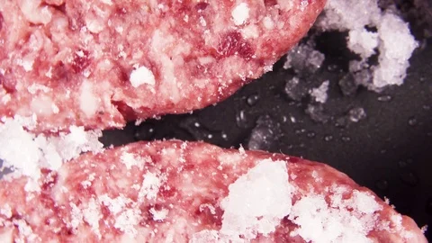 Fresh frozen cutlets rotate background top view Stock Footage 101652092