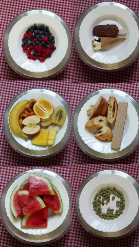 Fresh fruit and desserts compare healthier everyday food choices Stock Footage 340220967