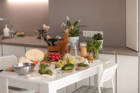 Fresh fruit and vegetables on the kitchen table Stock Photos