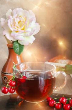 Fresh fruit cherry drink in a clear glass cup, and cherry berries on a fractal 写真素材