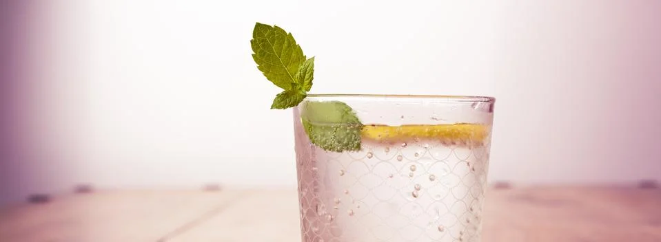 Fresh fruit lemonade drinks, refreshment infused water on a wooden table Stock Photos