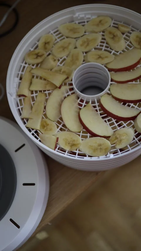 Fresh fruit prepared for dehydrating Stock Footage 340134870