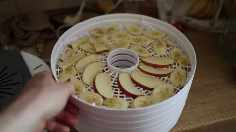 Fresh fruit prepared for dehydrating Stock Footage 340136712