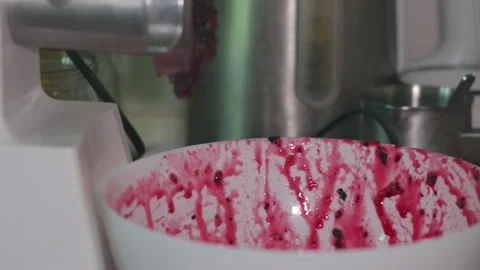 Fresh Fruit Puree Falling from Food Processor into a Large Mixing Bowl 動画素材 339650415