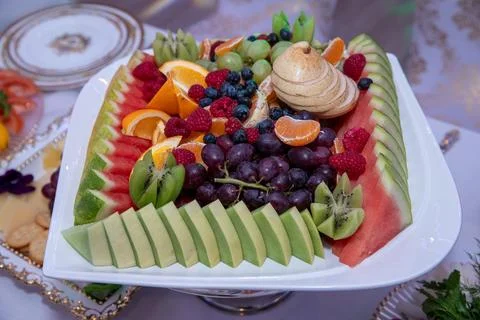 Fresh fruit salad on bright background, healthy diet concept Stock Photos
