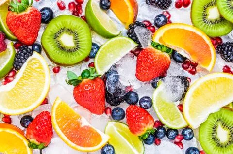 Fresh fruit slices background. Stock Photos