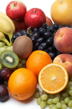 Fresh fruit on a white background. Stock Photos