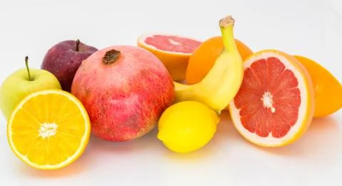 Fresh fruit on a white background. Stock Photos