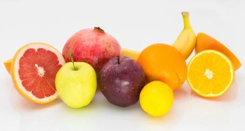 Fresh fruit on a white background. Stock Photos