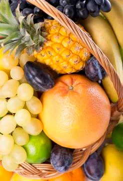 Fresh fruit in a wicker basket Stock Photos