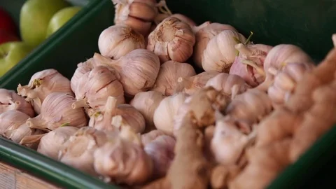 Fresh garlic in a box - grocery Stock Footage 74493229