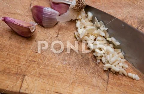 Fresh garlic food ingredient for a cookery background Stock Photos