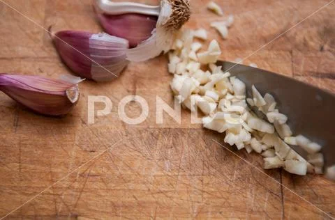 Fresh garlic food ingredient for a cookery background Stock Photos