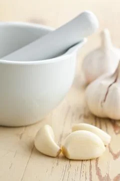Fresh garlic on kitchen table Stock Photos
