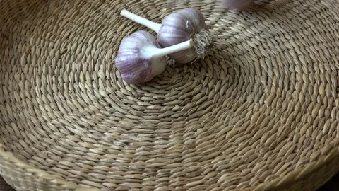 Fresh garlic in small basket Stock Footage 114247006