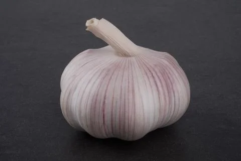 Fresh garlic on stone table Stock Photos
