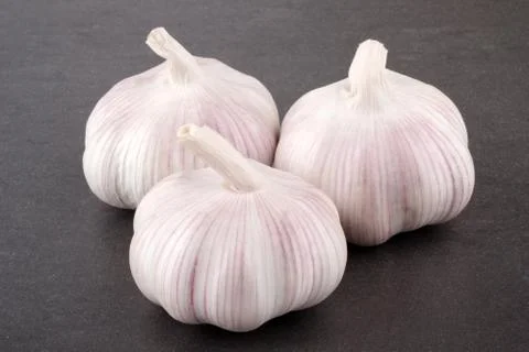 Fresh garlic on stone table 写真素材