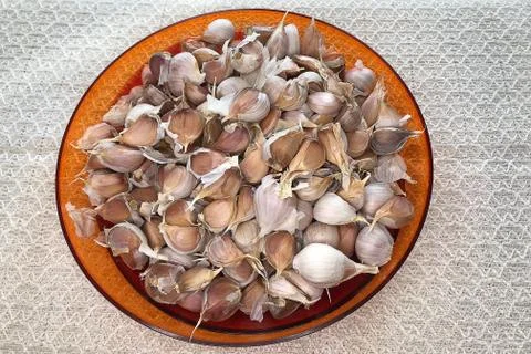 Fresh garlic on the table Stock Photos