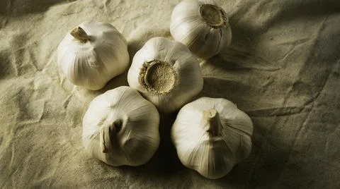 Fresh garlic on the table Stock Photos