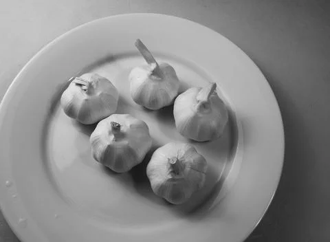 Fresh garlic on the table Stock Photos