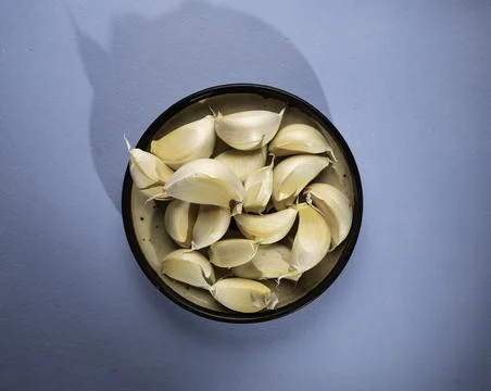 Fresh garlic on the table Stock Photos
