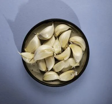 Fresh garlic on the table Stock Photos