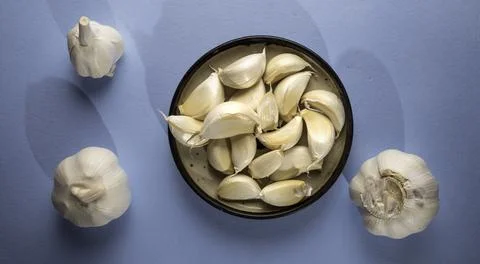 Fresh garlic on the table Stock Photos