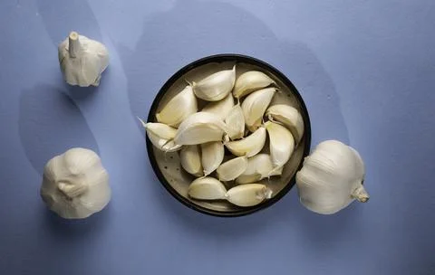 Fresh garlic on the table Stock Photos