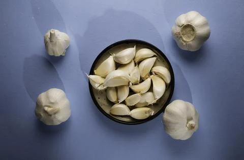 Fresh garlic on the table Stock Photos