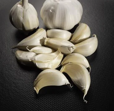 Fresh garlic on the table Stock Photos
