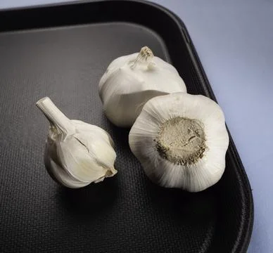 Fresh garlic on the table Stock Photos
