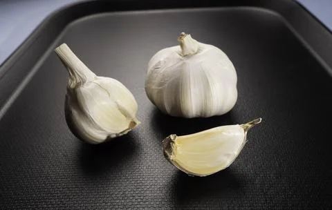 Fresh garlic on the table Stock Photos