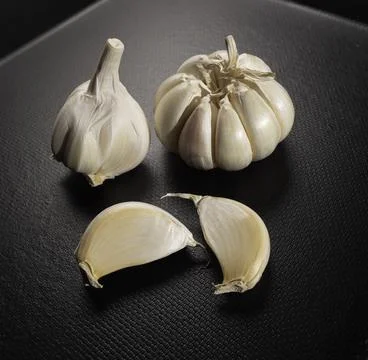 Fresh garlic on the table Stock Photos