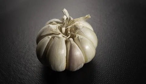 Fresh garlic on the table Фото