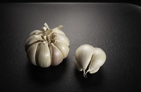 Fresh garlic on the table Stock Photos