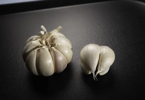 Fresh garlic on the table Stock Photos