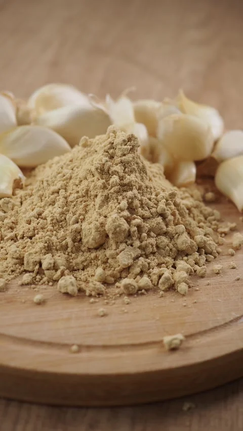 Fresh ginger and garlic preparation on a wooden board Stock Footage 333356880