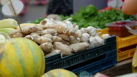 Fresh ginger in crates at the market Vídeo Stock 74910322