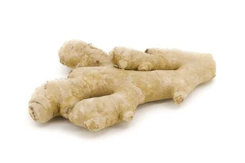 Fresh ginger displayed on soft white lighting. Stock Photos