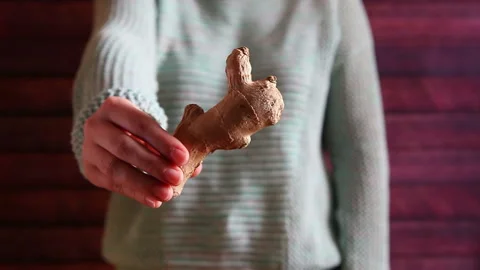 Fresh ginger, hand with tropical root as healthy food concept 動画素材 100920691