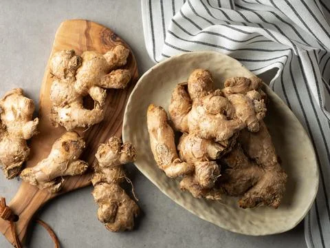 Fresh ginger on a plate Stock Photos