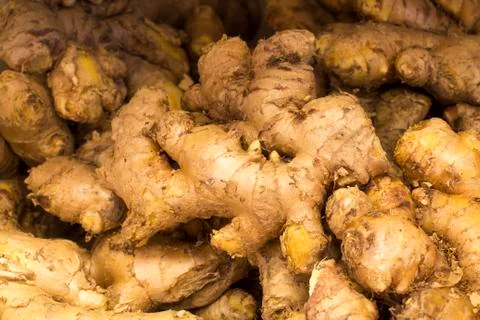 Fresh ginger root and ground ginger on a market in Arequipa, Peru.  Stock Photos