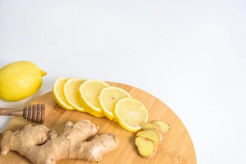 Fresh ginger root and lemons Stock Photos