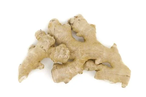 Fresh ginger root on clean white studio background. Stock Photos