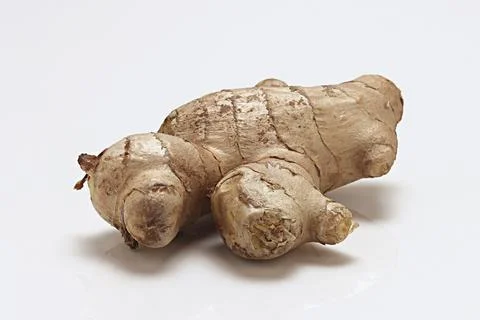 Fresh Ginger Root close up macro on white background Stock Photos