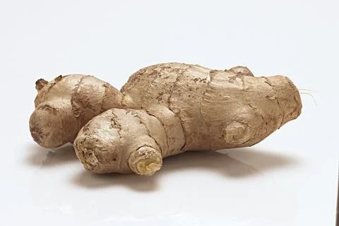 Fresh Ginger Root close up macro on white background Stock Photos
