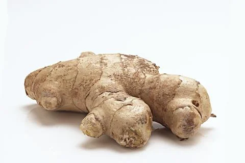 Fresh Ginger Root close up macro on white background Stock Photos