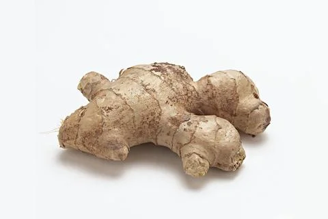 Fresh Ginger Root close up macro on white background Stock Photos