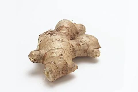 Fresh Ginger Root close up macro on white background Stock Photos