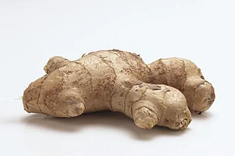 Fresh Ginger Root close up macro on white background Stock Photos